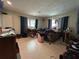 Spacious bedroom has a bed, closet, and large windows for natural light at 930 Aultman Rd, Kissimmee, FL 34744