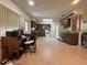 Large kitchen with a dining area and office space, perfect for modern living and hosting at 930 Aultman Rd, Kissimmee, FL 34744