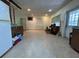 Open-plan kitchen flows into a dining area and has lots of potential for remodeling at 930 Aultman Rd, Kissimmee, FL 34744