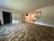 Open-concept living room with lots of space, connecting to other rooms via sliding glass door at 930 Aultman Rd, Kissimmee, FL 34744