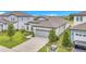 Aerial view of the home showcasing its layout, landscaping, and proximity to neighboring houses at 983 Silverlake Blvd, Lake Alfred, FL 33850