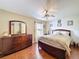 Bedroom with wood floors and neutral-toned walls at 1011 Dampierre Ct, Kissimmee, FL 34759