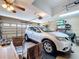 The garage features ample space for parking a car and storage at 1011 Dampierre Ct, Kissimmee, FL 34759