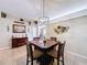 Eat-in kitchen with a dining table and stainless steel appliances, perfect for casual meals at 1011 Dampierre Ct, Kissimmee, FL 34759