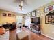 Cozy living room with neutral walls and tile flooring at 1011 Dampierre Ct, Kissimmee, FL 34759