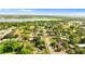 Real estate aerial view with location pin, showcasing the property's position within the lakeside community at 1024 Cohassett Ave, Lake Wales, FL 33853