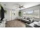 Living room with modern decor and hardwood floors, flooded with natural light at 1024 Cohassett Ave, Lake Wales, FL 33853