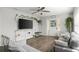 Bright living room featuring hardwood floors, modern decor, and natural light at 1024 Cohassett Ave, Lake Wales, FL 33853