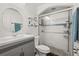 Neat bathroom with a glass door shower and vanity with sink and mirror at 1055 N Chickasaw Trl, Orlando, FL 32825