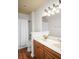 Bright bathroom featuring a double sink vanity with wood cabinets and a shower-tub combination at 1115 Mosaic Dr, Celebration, FL 34747