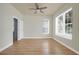 Well-lit bedroom featuring hardwood floors, and lots of natural light at 1115 Mosaic Dr, Celebration, FL 34747