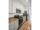 Kitchen featuring stainless steel appliances and granite countertops at 1115 Mosaic Dr, Celebration, FL 34747
