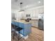 Kitchen featuring stainless steel appliances, a breakfast bar, granite countertops, and ample storage at 1115 Mosaic Dr, Celebration, FL 34747