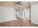 Spacious living room featuring wood floors, access to other rooms, and an open layout at 1115 Mosaic Dr, Celebration, FL 34747