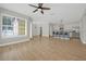 Spacious living area is open to the kitchen and dining areas, perfect for entertaining at 1115 Mosaic Dr, Celebration, FL 34747
