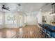 Open-concept living space with natural light and breakfast bar at 1115 Mosaic Dr, Celebration, FL 34747