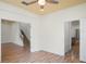 Inviting living space with wood floors, access to stairs, and an open layout at 1115 Mosaic Dr, Celebration, FL 34747