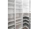 Walk-in pantry with custom shelving offers ample storage space at 1115 Mosaic Dr, Celebration, FL 34747