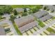 Aerial view of a neighborhood with lush green spaces and pool at 13758 Daniels Landing Cir, Winter Garden, FL 34787