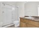 Bathroom featuring walk-in shower and vanity with a granite countertop at 13758 Daniels Landing Cir, Winter Garden, FL 34787