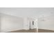 Bright living room boasts wood-look floors and chandelier lighting near stairway at 13758 Daniels Landing Cir, Winter Garden, FL 34787