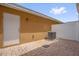 Private outdoor patio area with brick pavers, a white door, and modern AC unit at 13758 Daniels Landing Cir, Winter Garden, FL 34787
