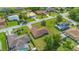 Aerial view showcases home, lawn and neighborhood, blending comfort and convenient suburban living at 14091 Sw 32Nd Terrace Rd, Ocala, FL 34473