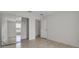 Bedroom featuring a mirrored closet, a window view, and neutral paint at 14091 Sw 32Nd Terrace Rd, Ocala, FL 34473