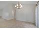 Bright dining room with chandelier and sliding door to the backyard at 14091 Sw 32Nd Terrace Rd, Ocala, FL 34473