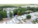 The community features a serene pond with fountain and beautiful landscaping, located close to local amenities at 143 Piedmont Park Ave, Davenport, FL 33897