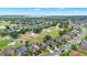 Community with houses adjacent to a golf course at 1560 The Oaks Blvd, Kissimmee, FL 34746