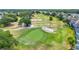 Golf course fairway and sand bunker at 1560 The Oaks Blvd, Kissimmee, FL 34746