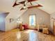 Finished attic space with natural light, wood floors, and a cozy atmosphere at 1850 Orangewood Ave, St Cloud, FL 34772