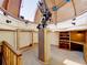 Interior view of an observatory with a large telescope and built-in shelving at 1850 Orangewood Ave, St Cloud, FL 34772