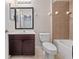 Bathroom with a vanity, mirror, and shower-tub combo at 1917 Compass Flower Way, Ocoee, FL 34761