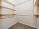 Walk-in closet with custom shelving and ample storage space at 1917 Compass Flower Way, Ocoee, FL 34761
