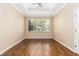 Bright bedroom with natural light coming through the window and ceiling fan at 2376 Palm Tree Dr, Kissimmee, FL 34759