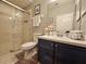 Nicely appointed bathroom featuring a shower and stylish vanity at 2531 Old Kent Cir, Kissimmee, FL 34758