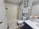 Bright bathroom with a shower-tub combination, vanity with modern fixtures, and a toilet at 2531 Old Kent Cir, Kissimmee, FL 34758