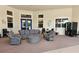 Comfortable patio area with stylish seating, vending machine, and pool view at 2531 Old Kent Cir, Kissimmee, FL 34758