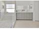 Bathroom with walk-in glass shower, and double sink vanity at 2642 Gild Dust Cir., Kissimmee, FL 34744