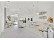 Open-concept living space featuring modern decor, high ceilings, and abundant natural light at 2642 Gild Dust Cir., Kissimmee, FL 34744