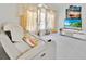 Home theater room with comfortable seating and large screen TV for immersive viewing at 2642 Gild Dust Cir., Kissimmee, FL 34744