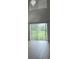 Bright living room with sliding glass doors offering natural light at 2650 Patrician Cir, Kissimmee, FL 34746