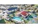 Aerial view of community pool, clubhouse and tennis courts at 2729 Club Cortile Cir, Kissimmee, FL 34746
