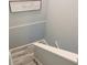 A well lit stairway to an upper level is shown at 2729 Club Cortile Cir, Kissimmee, FL 34746