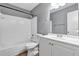 Bathroom featuring a tub with shower, a toilet and a vanity with sink at 2864 N Powers Dr # 150, Orlando, FL 32818