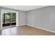 Comfortable bedroom provides natural light, sliding glass door, and access to the screened porch at 2864 N Powers Dr # 150, Orlando, FL 32818
