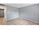 Neutral bedroom with tiled floor and baseboard, ready for your personal touch at 2864 N Powers Dr # 150, Orlando, FL 32818