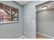 Neutral-toned hallway showcases natural light and easy access to rooms at 2864 N Powers Dr # 150, Orlando, FL 32818